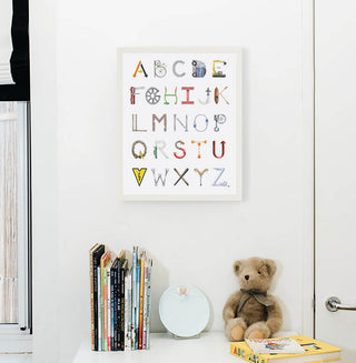 Construction Alphabet from The Letter Nest, White Frame installed in nursery