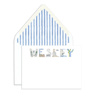 Flatlay photo of The Letter Nest's Washington, D.C. Personalized Stationery with blue envelope liners in the name "Wesley"