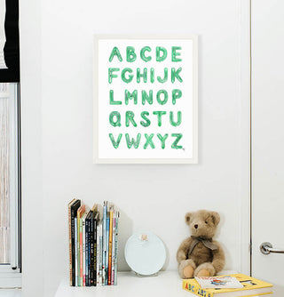 Green Balloon Alphabet from The Letter Nest, White Frame installed in nursery