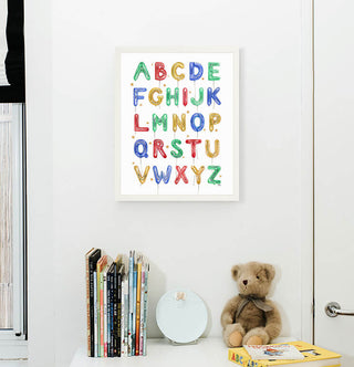Green Balloon Alphabet from The Letter Nest, White Frame installed in nursery