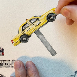 Sally painting a "T" for Taxi