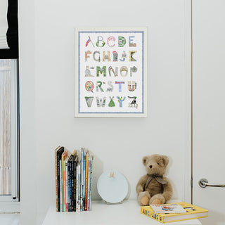 Washington DC Alphabet by The Letter Nest with blue border and white frame